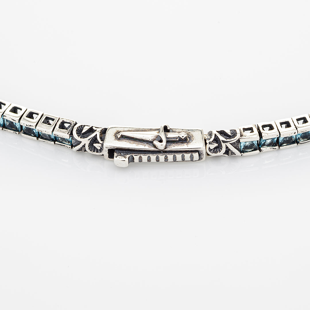 Bracciale Tennis in argento con pietre azzurre | Cesare Paciotti