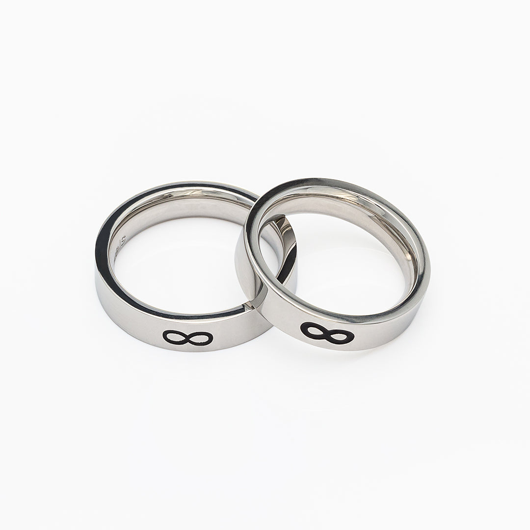 Coppia di Fedine in acciaio con simbolo Infinito | Mabina